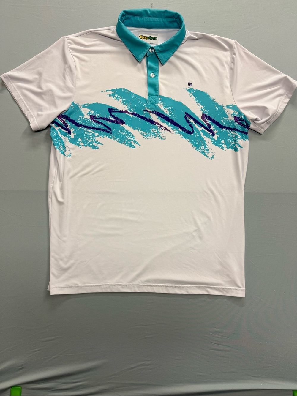 Tipsy Elves White Polo with Teal Trim and Yellow-Green Logo